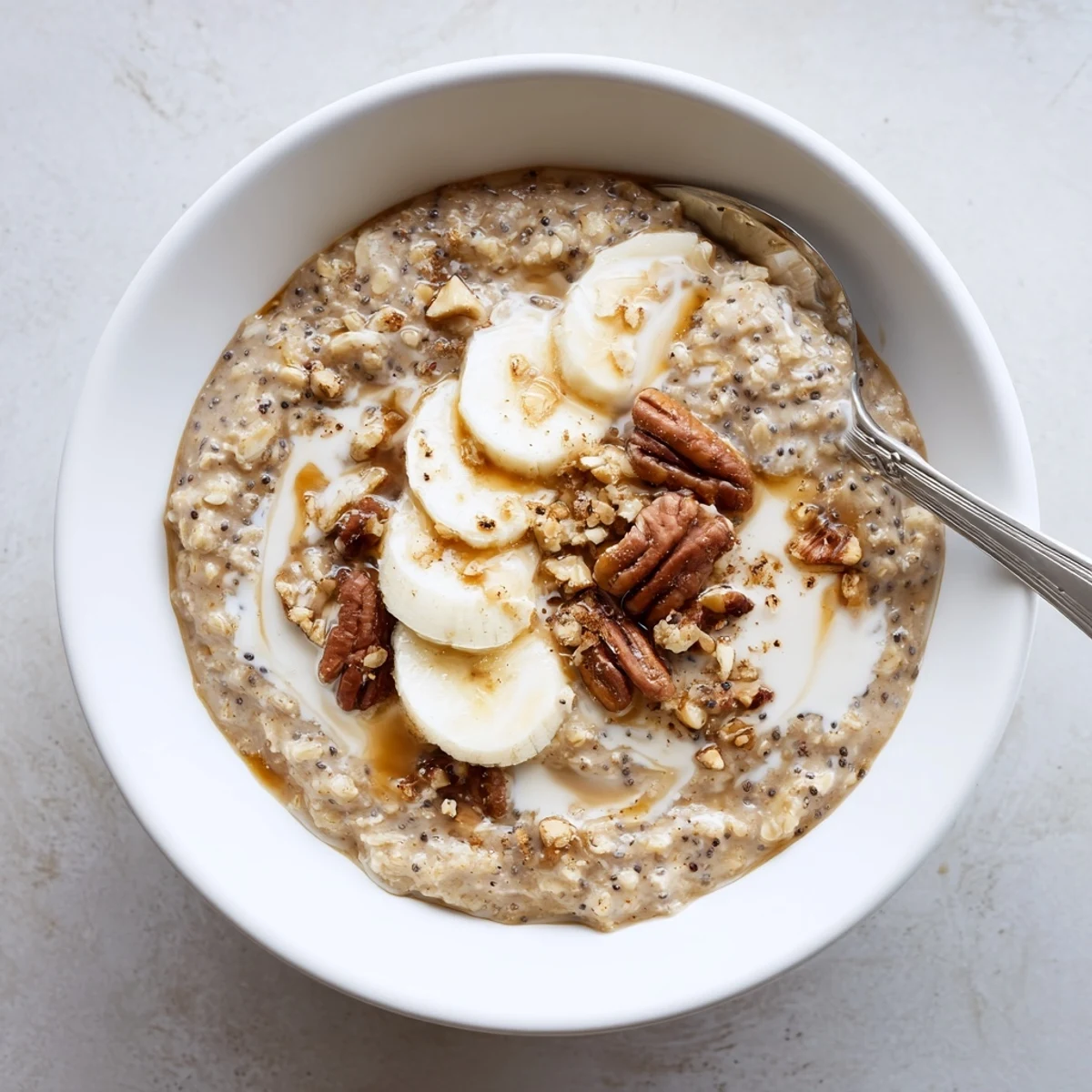 Creamy Brown Sugar Coffee Overnight Oats topped with sliced banana and pecans