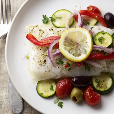 Bright Air Fryer Mediterranean Cod In Parchment Paper nestled on rustic plate